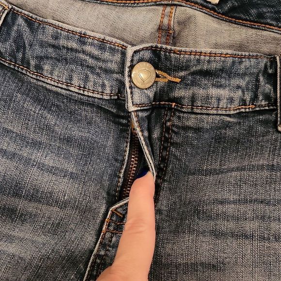 Medium wash rolled cuff Torrid jean shorts size 18. - Picture 6 of 8